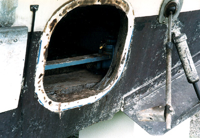 Close-up of Inboard/Outboard transom with engine removed showing rotting wood