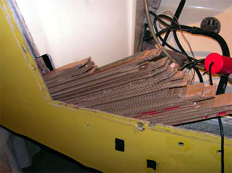 port side of transom with cardboard strips being removed