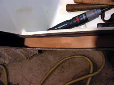 plywood strips inside of transom showing a staggered joint