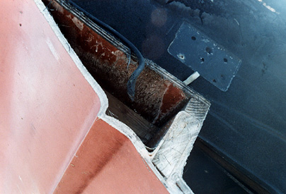 Side stringer encapsulated in fiberglass, closeup