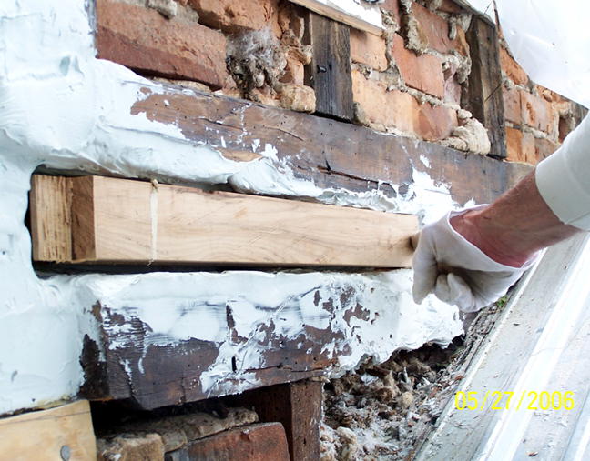 Foundation wall filled with lapped wood into the L&L/sawdust mixture (5)