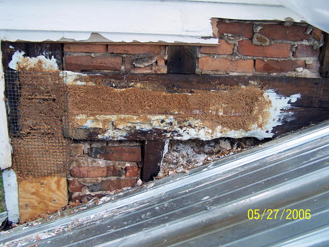 Foundation wall filled with L&L/sawdust to fill to dimension using wire mesh (7)