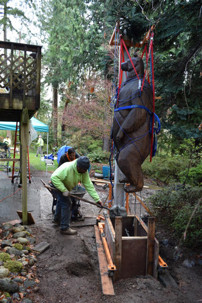 Filling the form with concrete, one shovel at a time