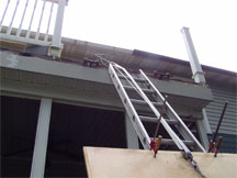 Hoisting Plywood to Deck